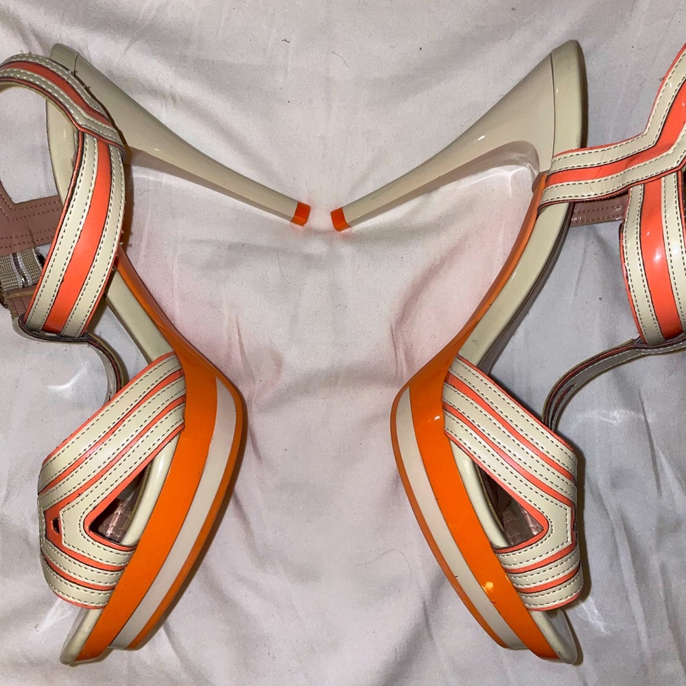 These are used Andrea high heels, 8.5 in Women’s, and they are coral and beige. - Picture 2 of 4